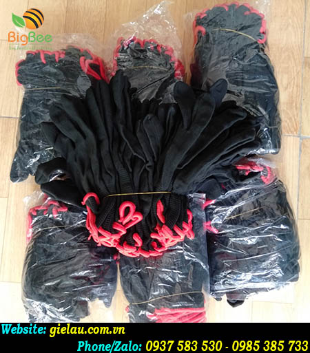 Găng tay vải thun đen của Thu Hồng được đóng gói 10 đôi 1 bao